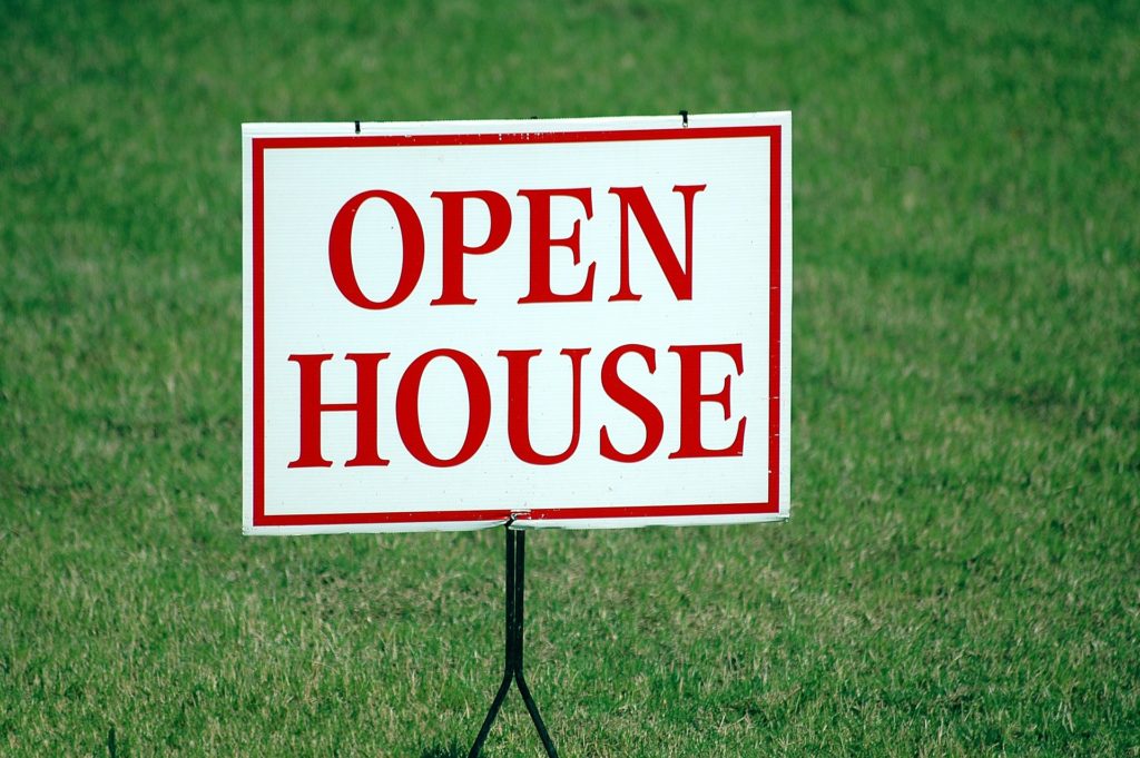 Buyers Negotiating Power Close Up of an Open House Sign